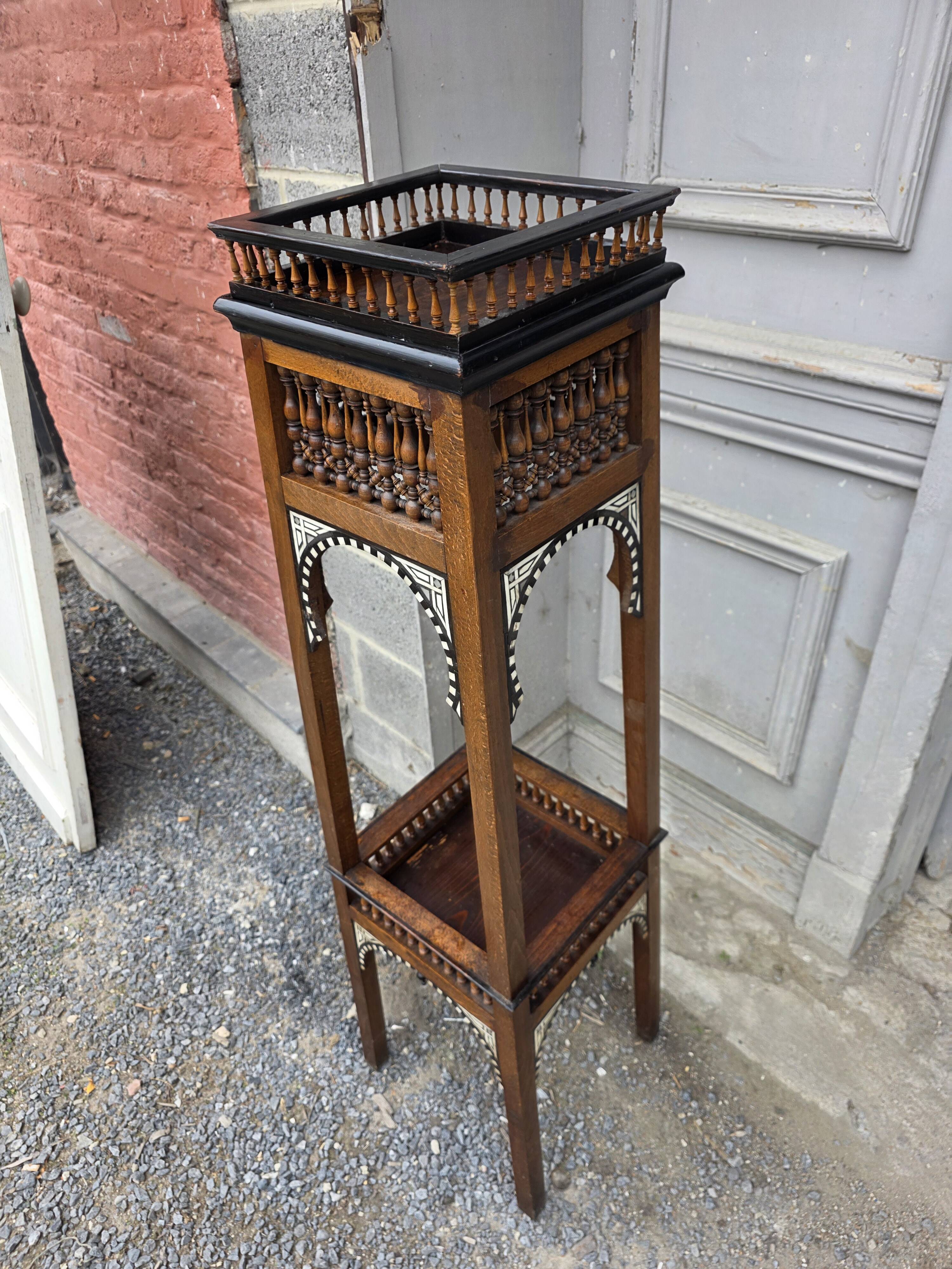 Antique pedestal from the early 20th century.