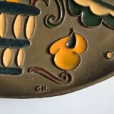 Old decorative brass and enamel wall plate signed GH