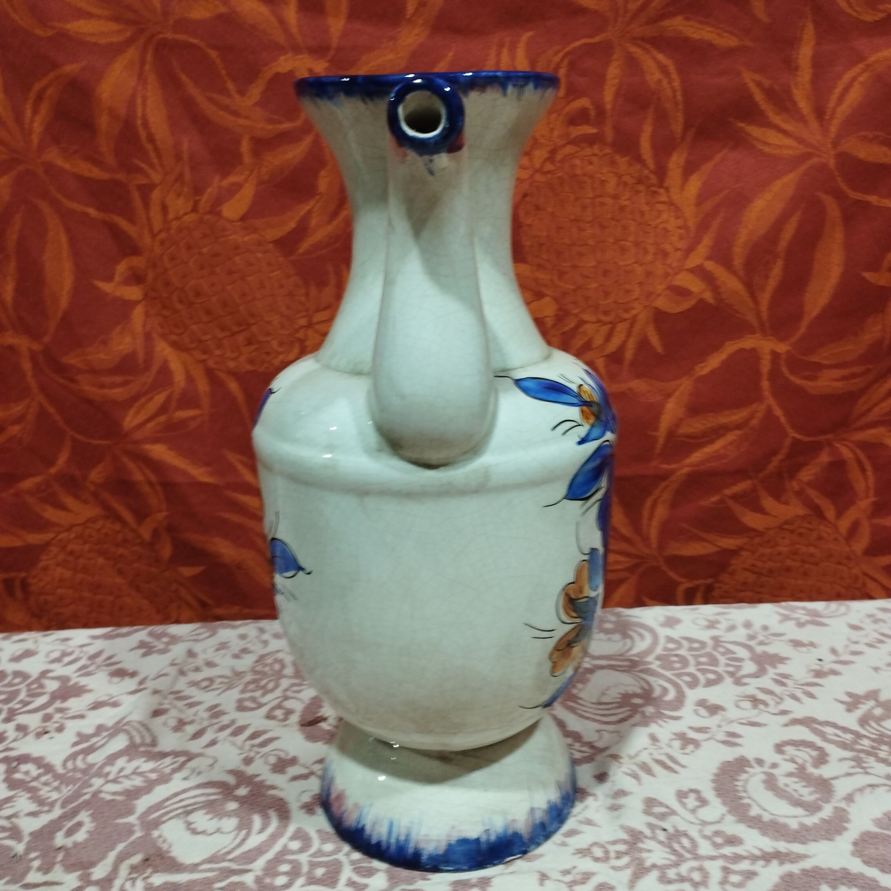 Hand-painted cracked ceramic pitcher