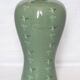 Korean vase in crackled celadon with a pattern of ducks and clouds.