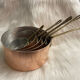 Old copper pan battery