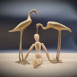Duo brass herons