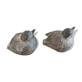 Vintage salt and pepper shakers in the shape of a pair of sparrows.