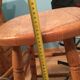 Vintage bar counter with natural wood stools