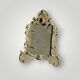 Gilded bronze wall mirror, beveled glass