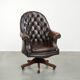 Brown cow leather Chesterfield office chair on wheels in English style