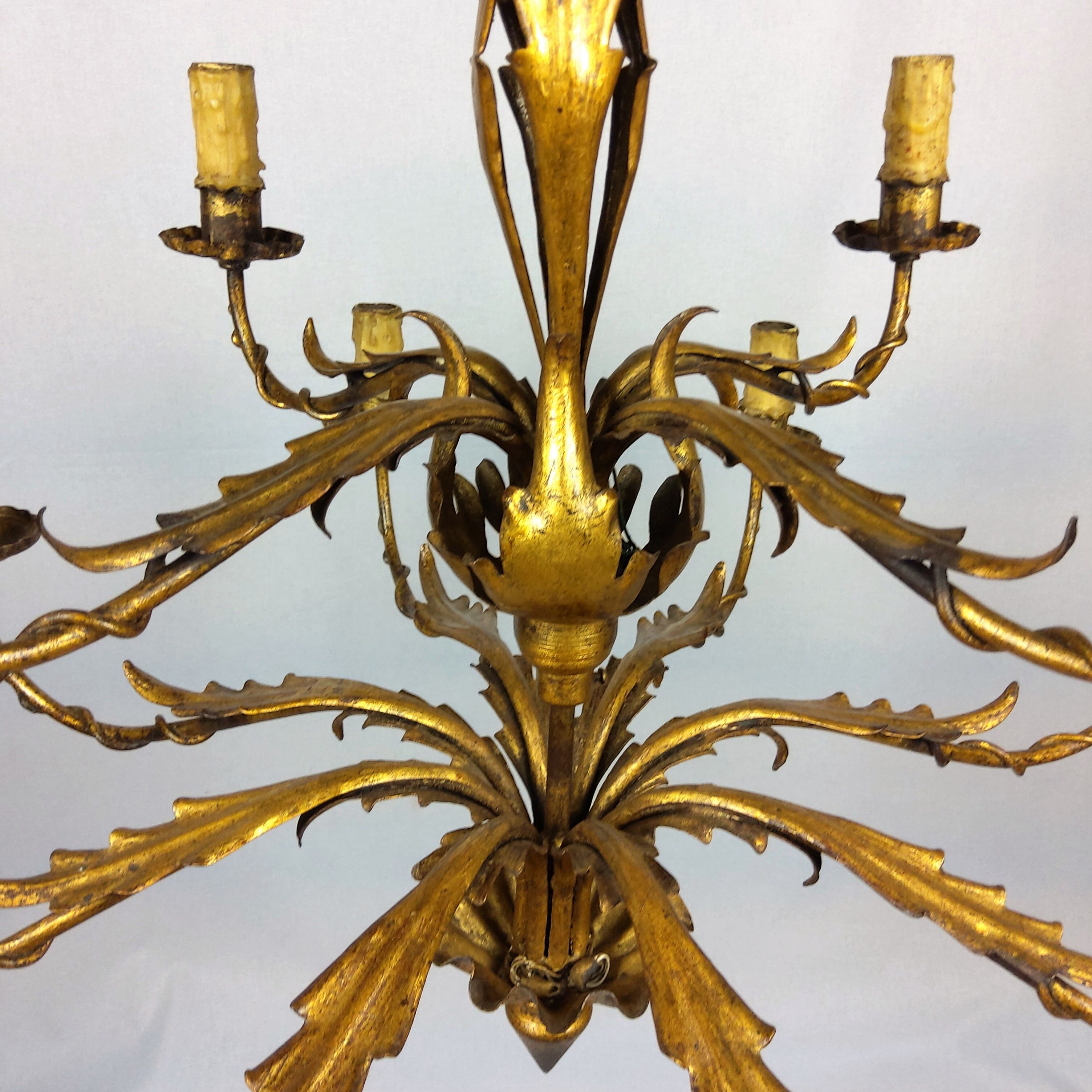 Golden luster with 12 arms of light decorated with leaves 1940