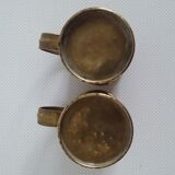 Pair of brass steins