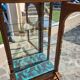 Showcase bookcase in molded and carved walnut