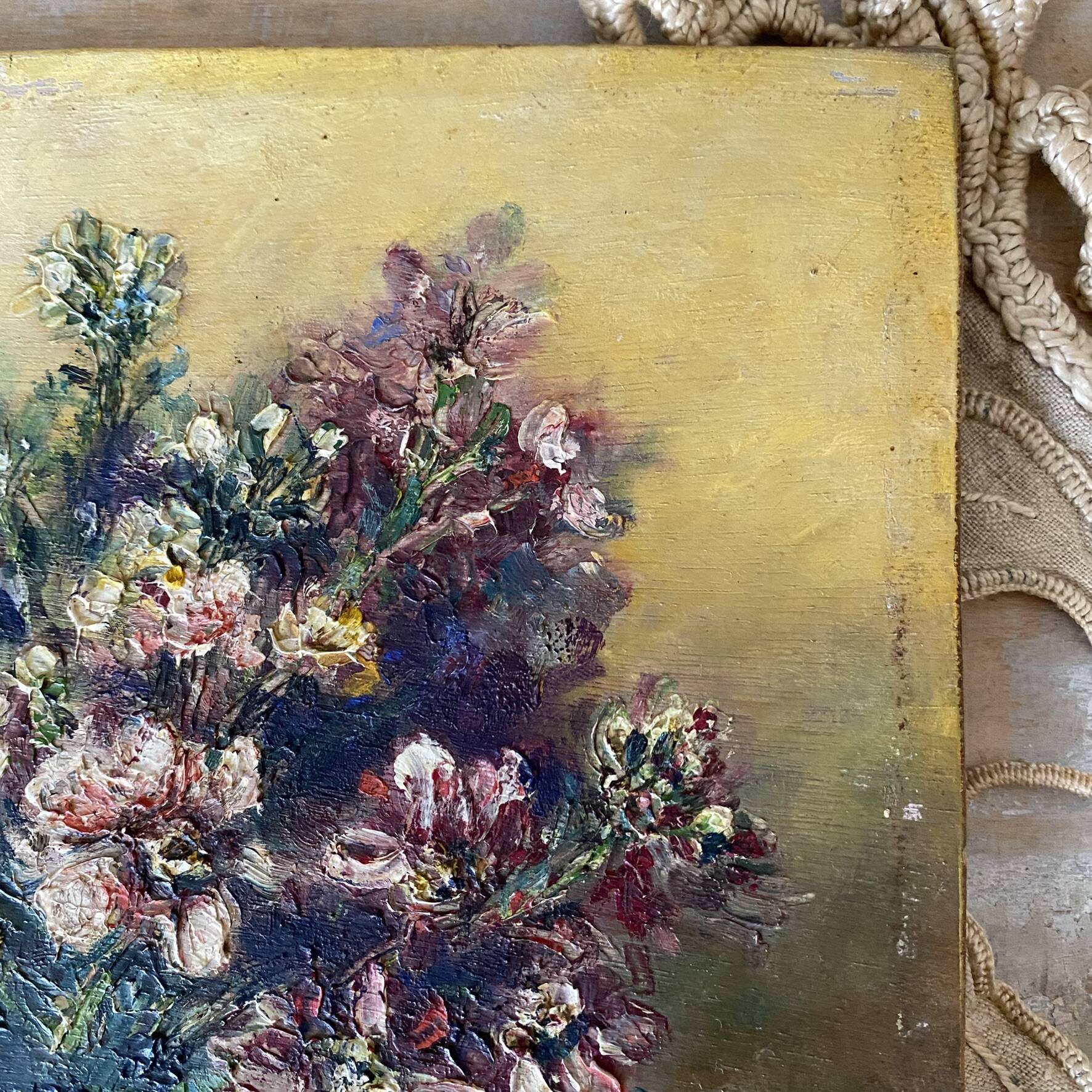 Old painting of a bouquet of flowers, oil on wood.