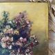 Old painting of a bouquet of flowers, oil on wood.