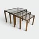 Set of 3 nesting tables in brass and glass. French work by Guy Lef.