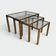 Set of 3 nesting tables in brass and glass. French work by Guy Lef.