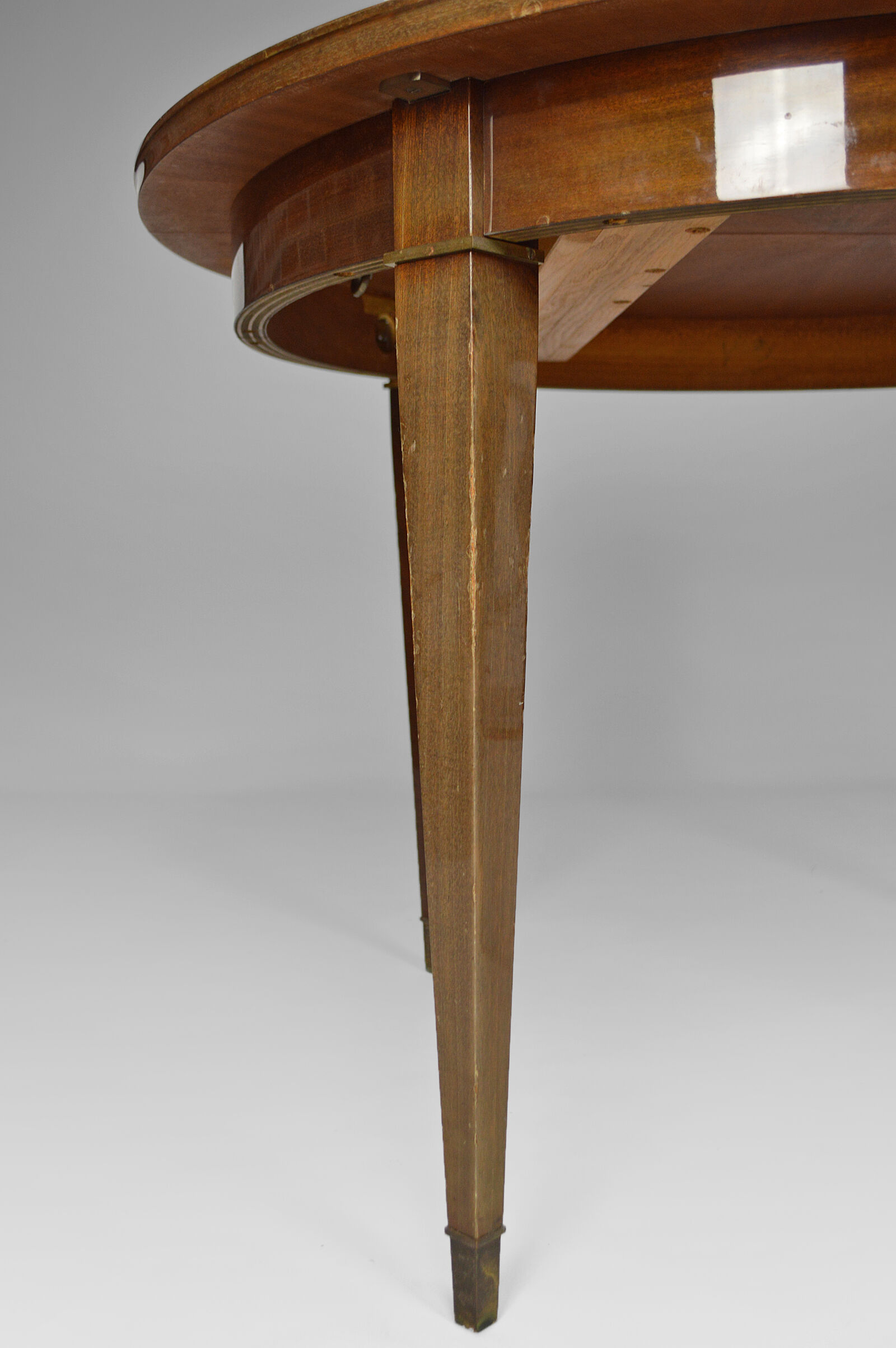 Art Deco mahogany round table by Jacques Adnet around 1940