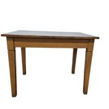 Vintage wooden table with a mint green top.