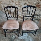 Pair of antique Napoleon III chairs in blackened wood and fabric