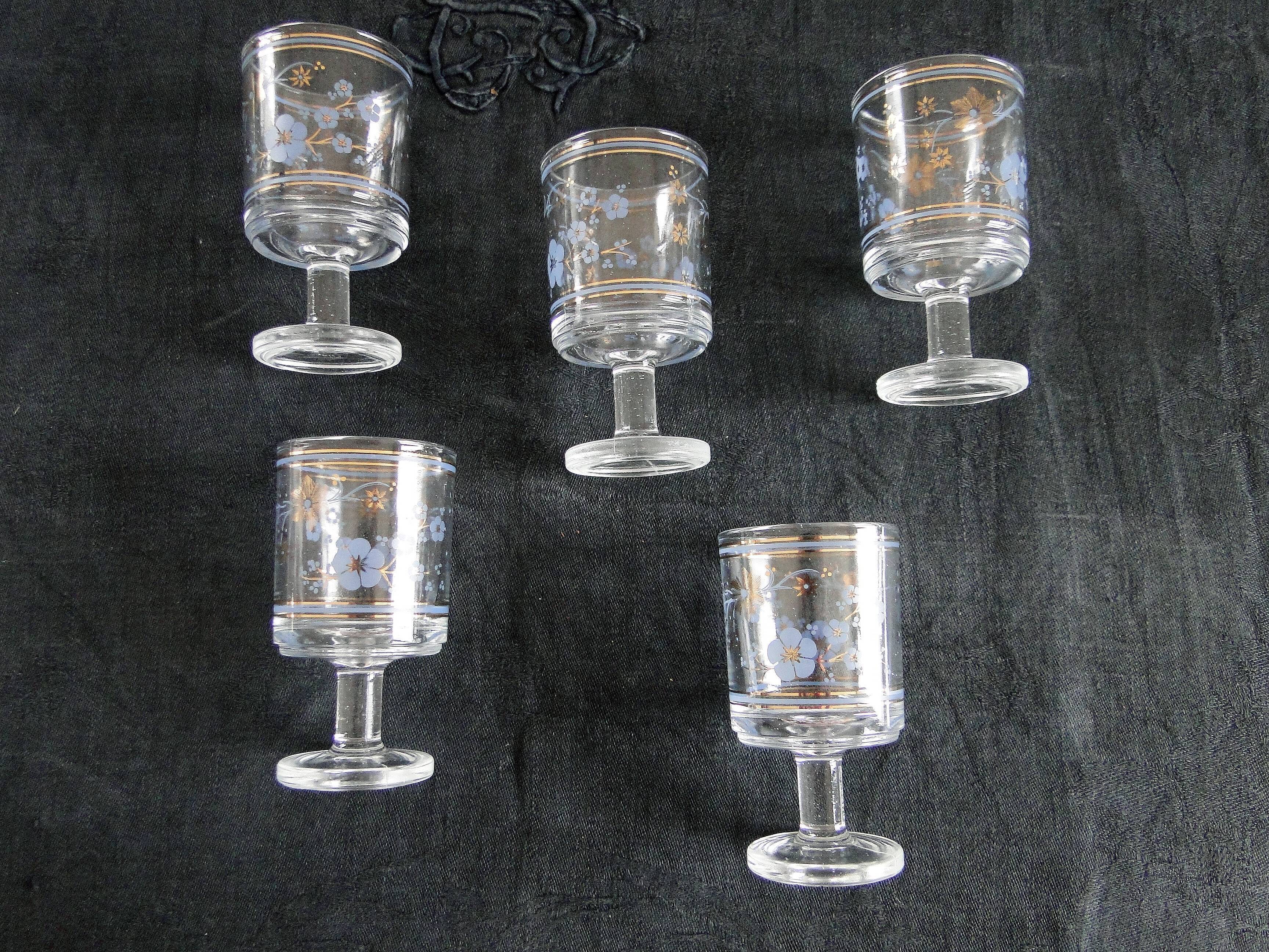 5 old glasses on foot floral decoration blue and gold vintage crystal?