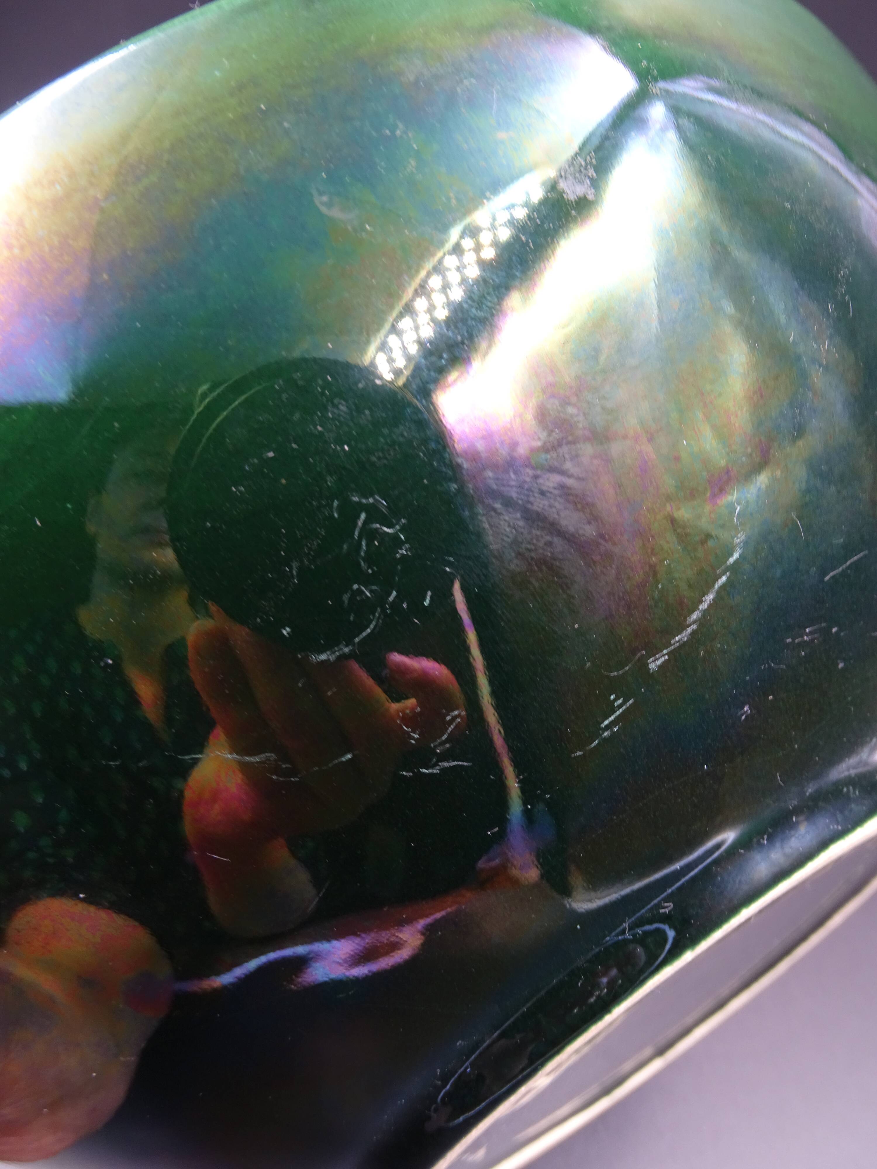 Green faience bowl decorated with multicolored drips around 1970