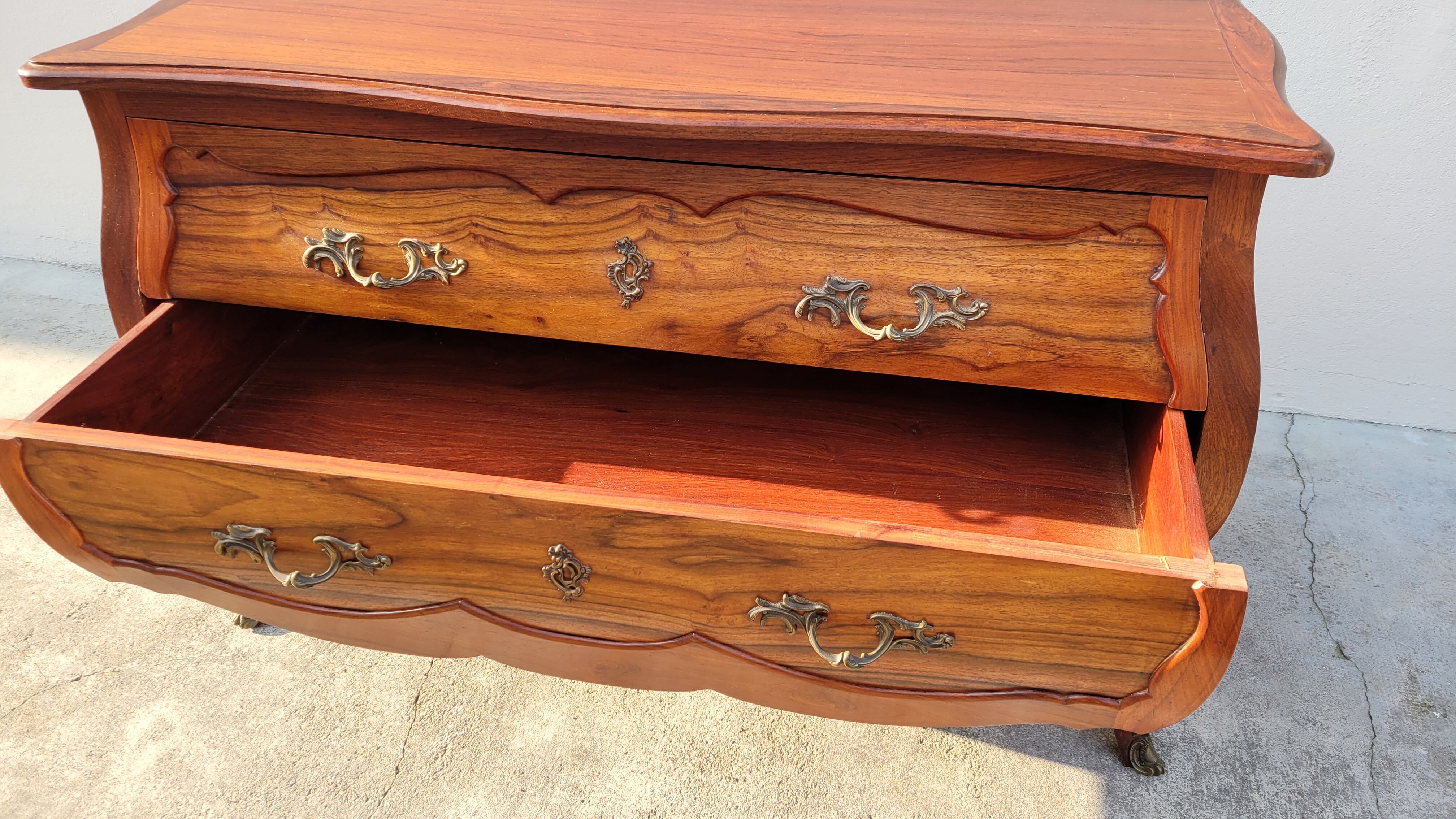 Curved Louis XV style commode in mahogany.