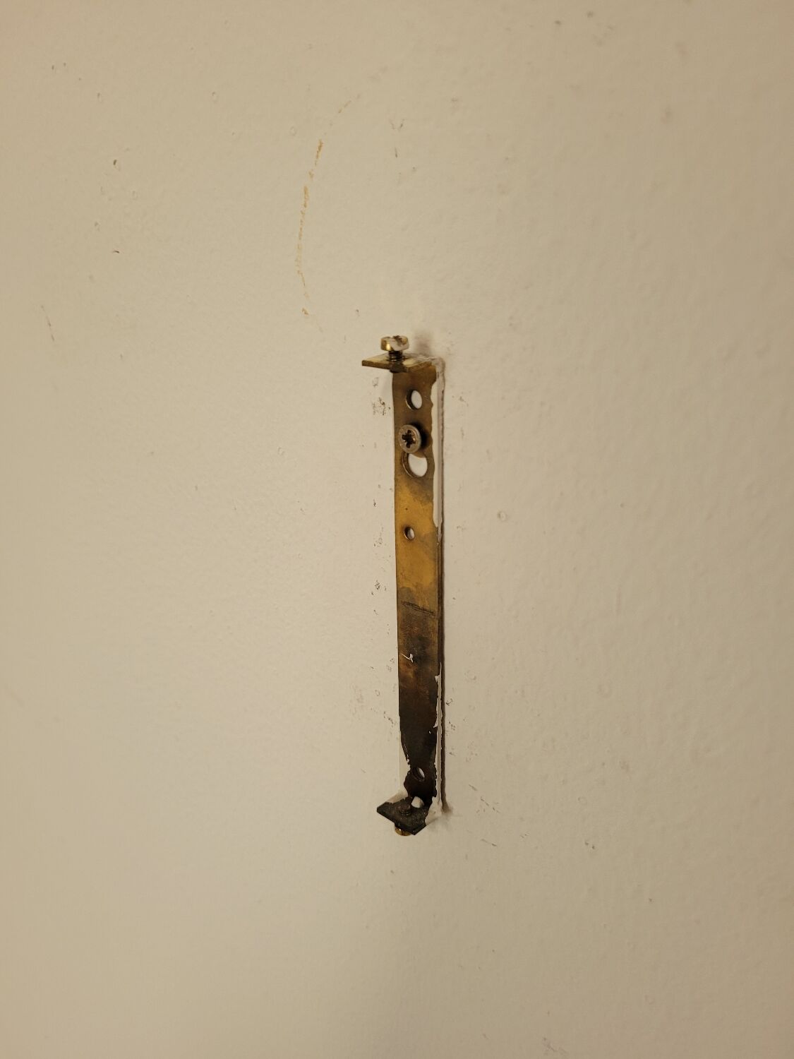 Pair of vintage wall lights in brass and glass from the 70s