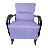 Art Deco armchair in plum fabric and black lacquered wood, 1920s.
