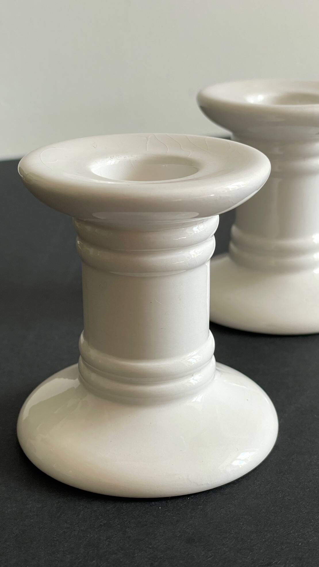 Pair of White Ceramic Candlesticks