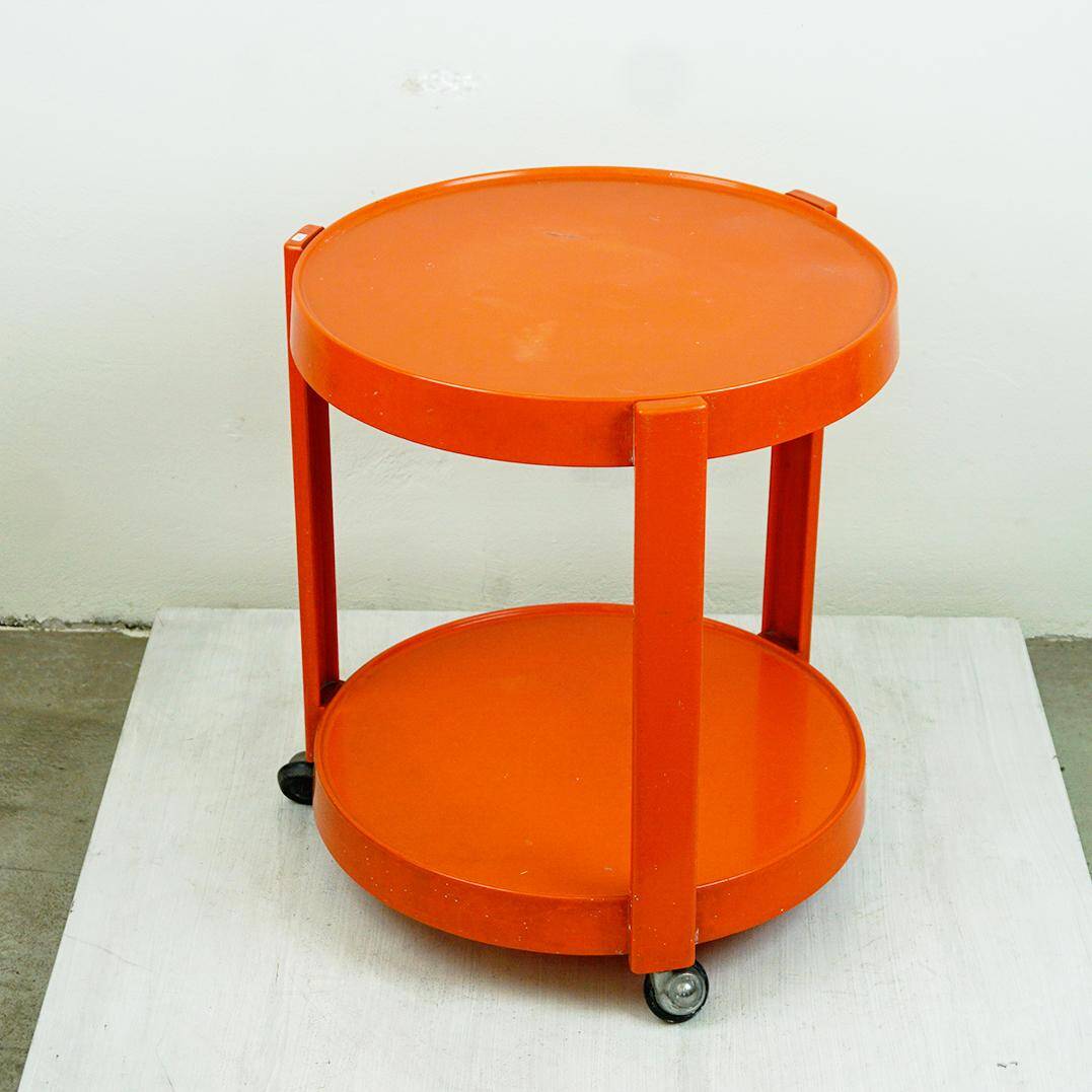 Circular orange Italian Space Age plastic trolley