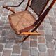 Bamboo folding chair and caning, leather and brass