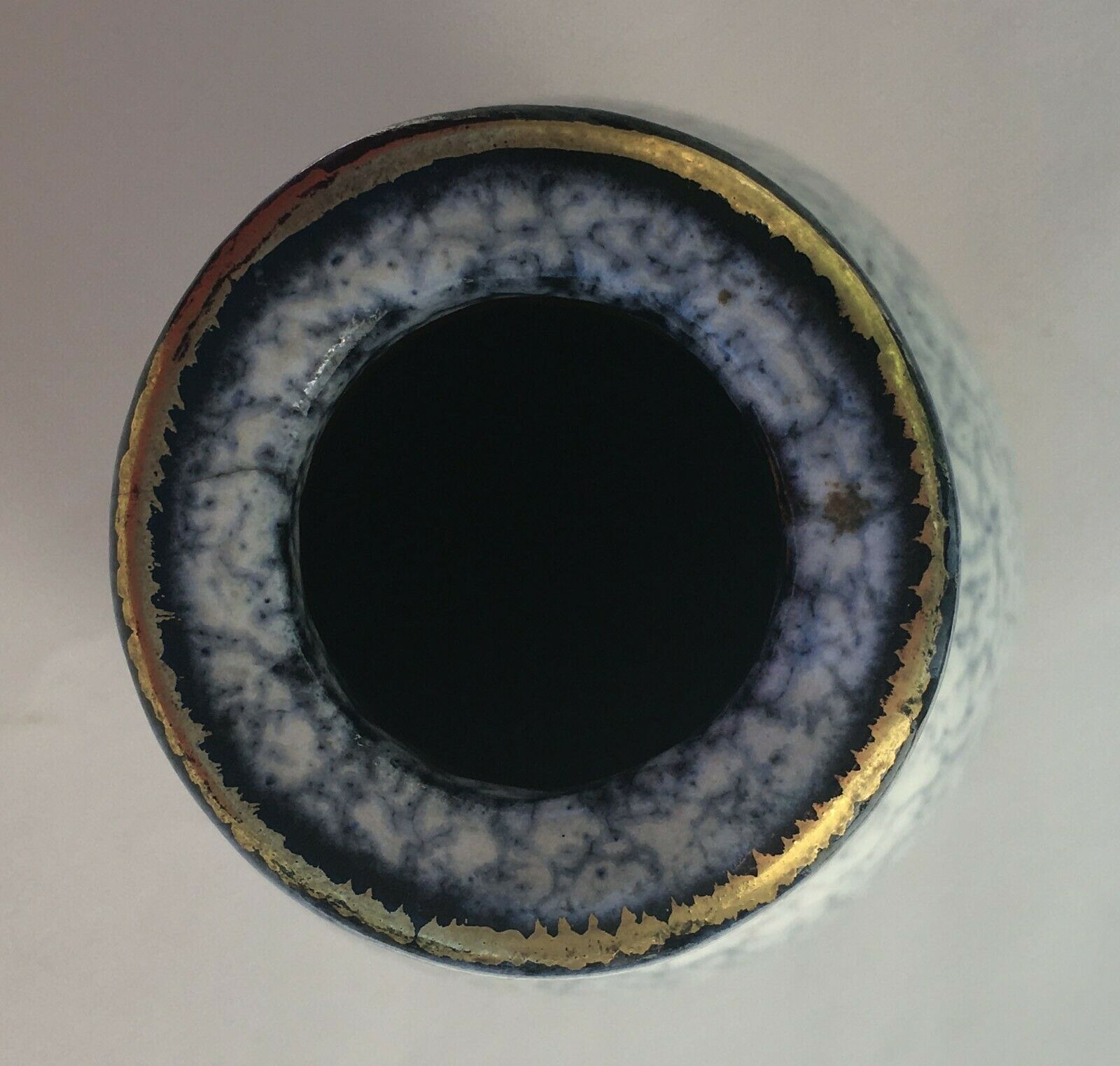 Thick ceramic vase in art deco style