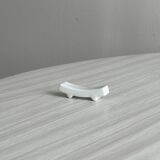 Set of white porcelain chopstick holders