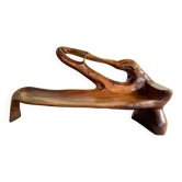 Banc sculptural en bois massif