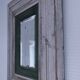 Beveled mirror patinated wood early 20th century