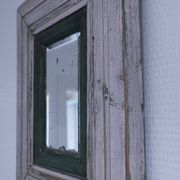 Miroir biseauté bois patiné début xxème