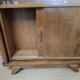 Vintage retractable swivel bar cabinet from the 1950s