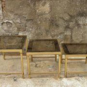 Brass, gold metal and 70s mirror glass tables