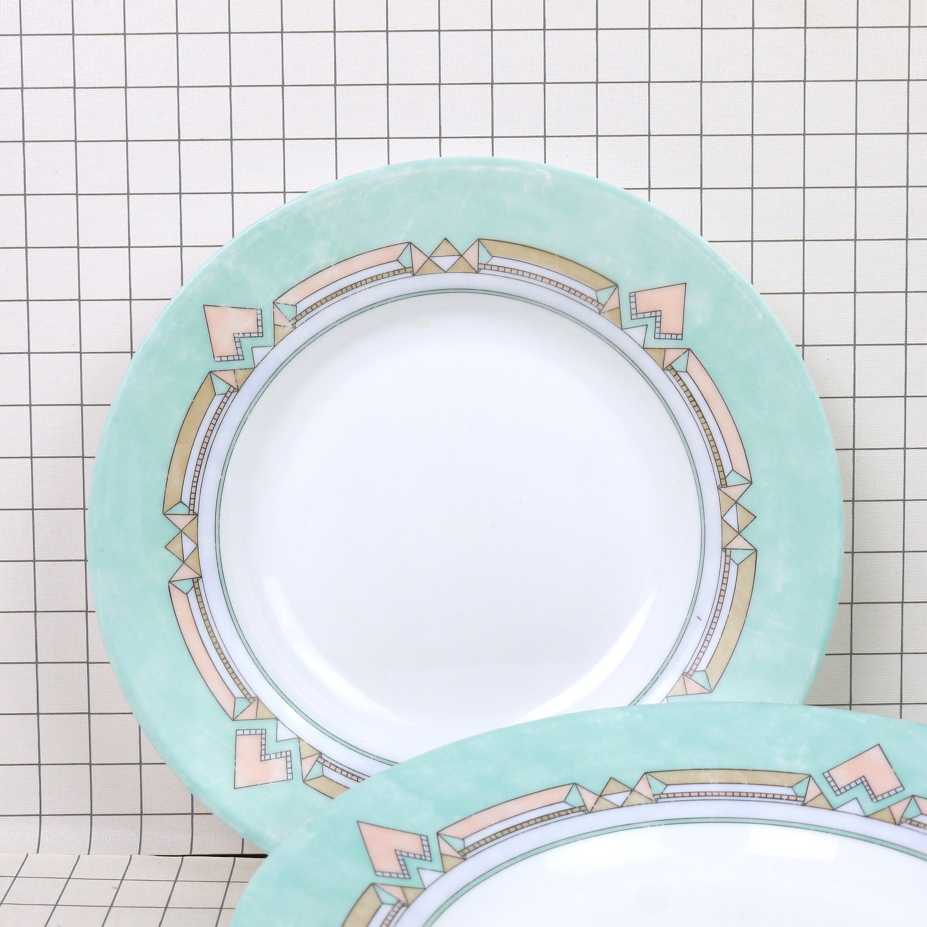 Six Arcopal soup plates