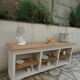 Craft furniture enhanced in pearl gray, shelves and top in raw wood.
