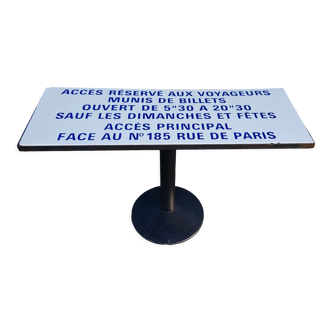 Table-console with old reformed plaque of the Paris metro "reserved access"