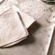 Antique tablecloth in pure linen tinted coral pink
