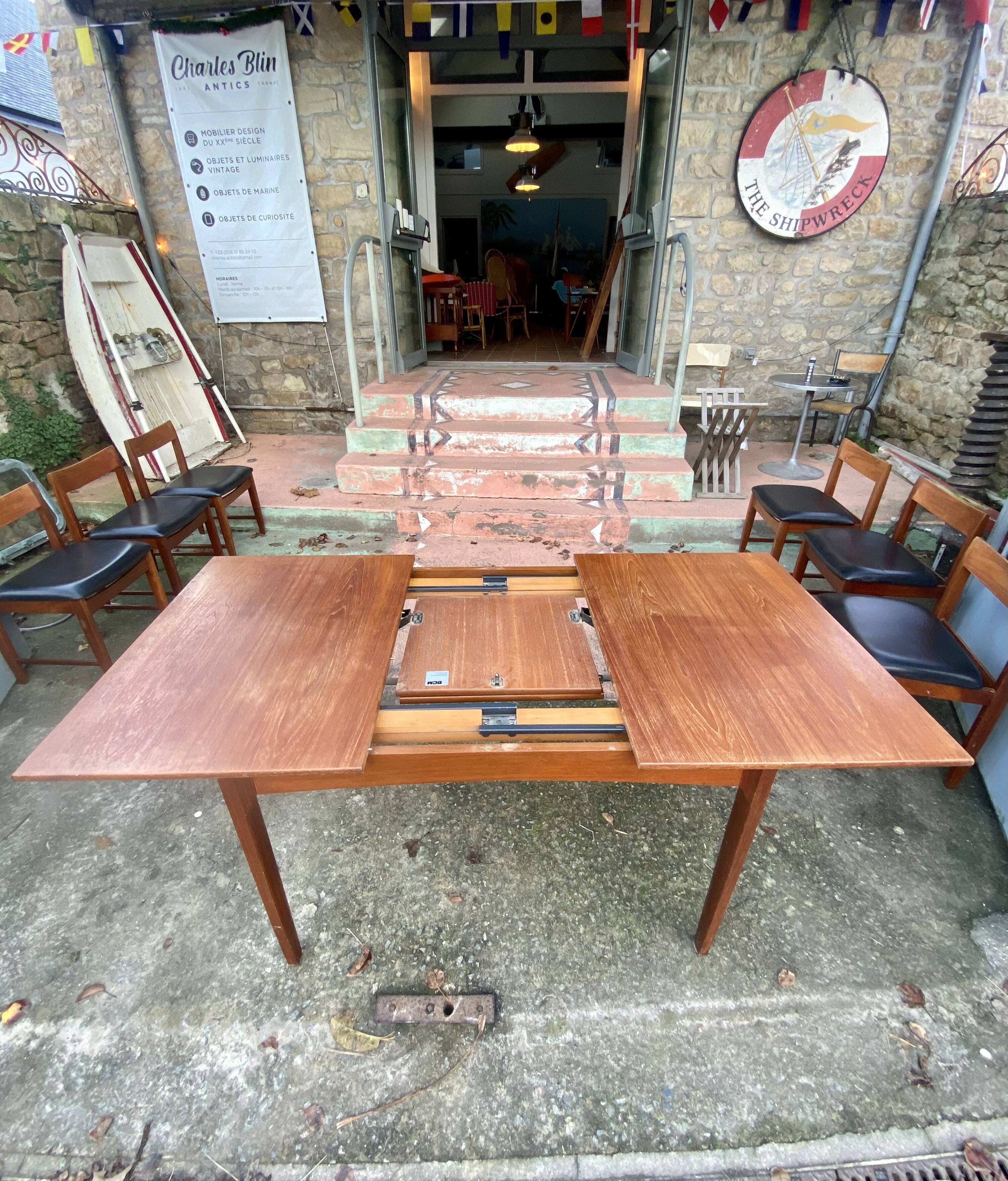Set of 6 chairs and dining room table with extensions “BCM” circa 1960