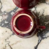 Burgundy cup and saucer