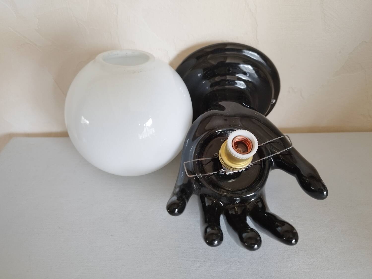 Hand-shaped wall light