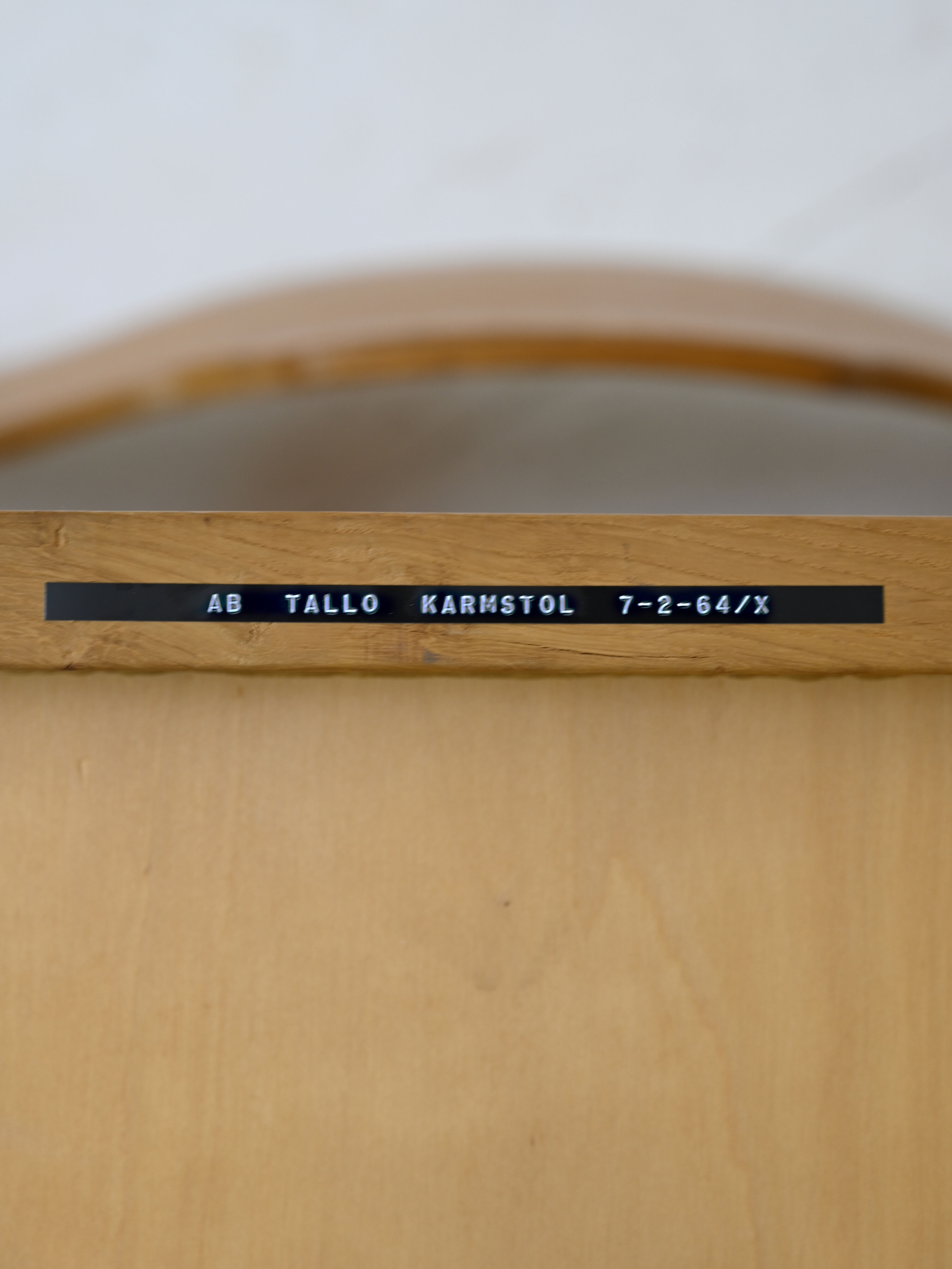 Wooden chair with armrests