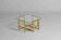 Geometrical regency coffee table in patinated brass, 1970s
