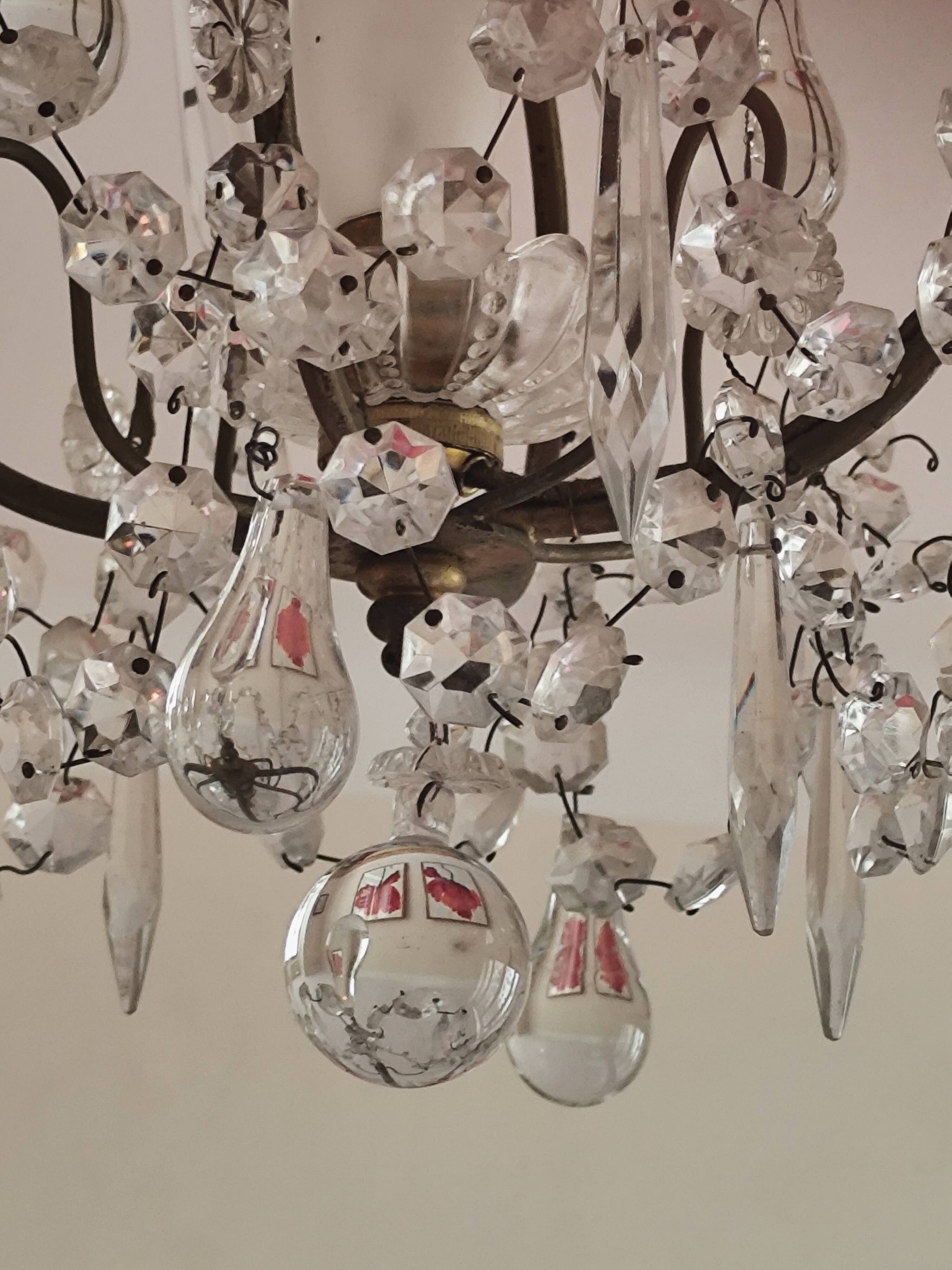 brass cage chandelier with crystal tassels