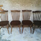 Eight mismatched bistro chairs