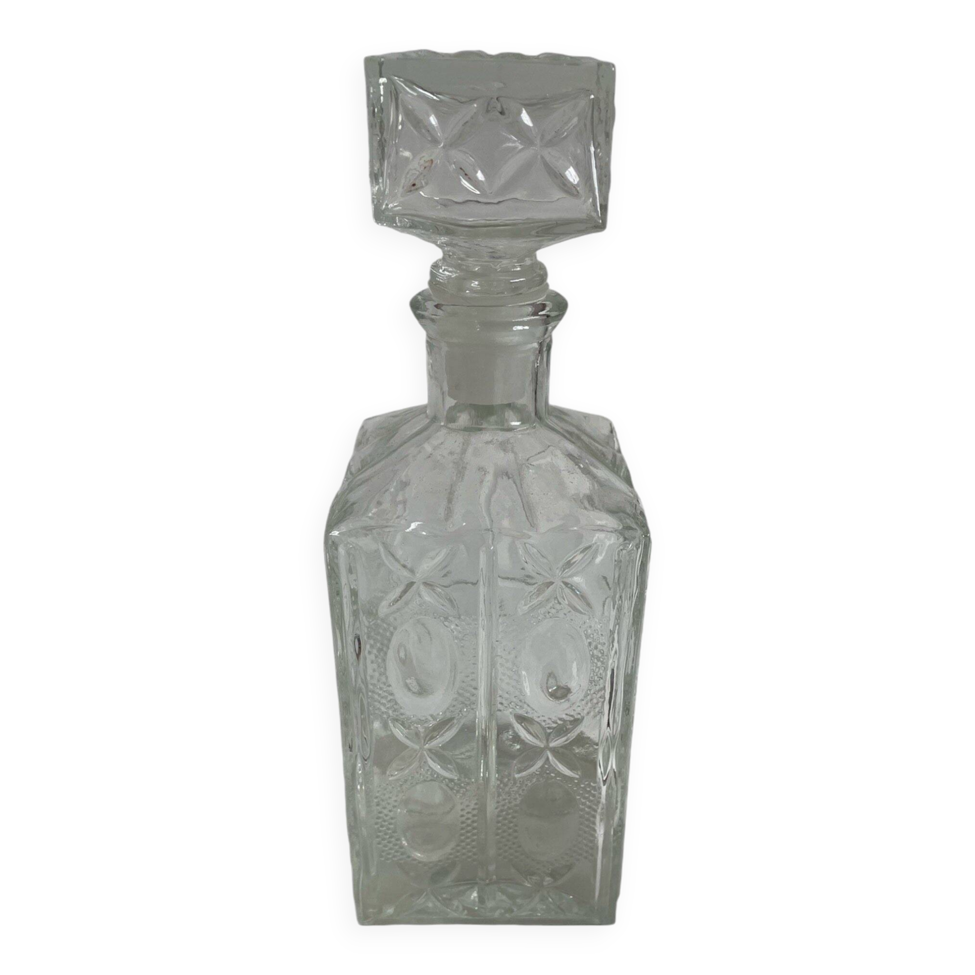 Molded glass carafe, 1960s-1970s, stylized flower decoration, oval, square base, stopper, rosette