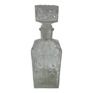Molded glass carafe, 1960s-1970s, stylized flower decoration, oval, square base, stopper, rosette