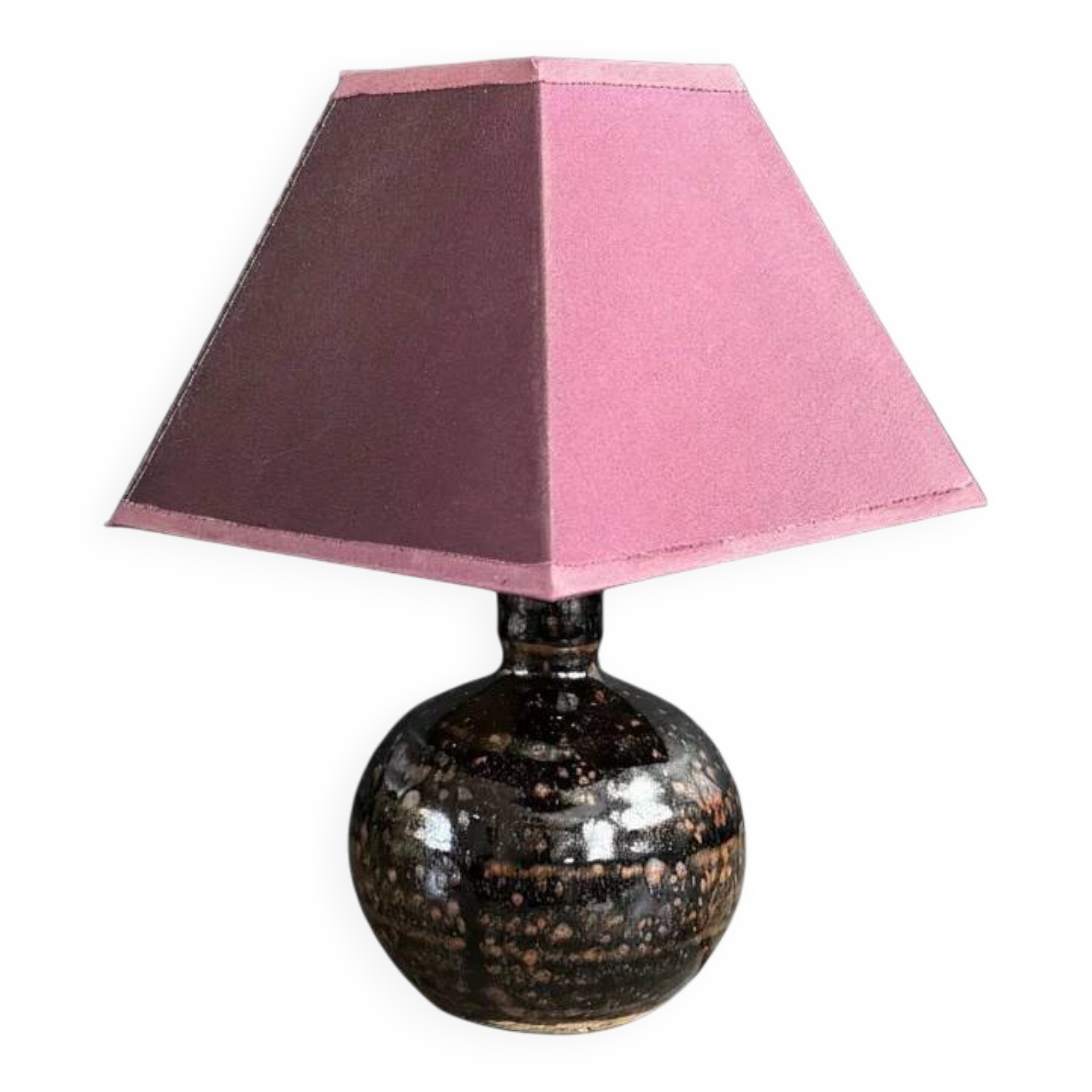 Ceramic floor lamp with a pyramidal shade and square base.
