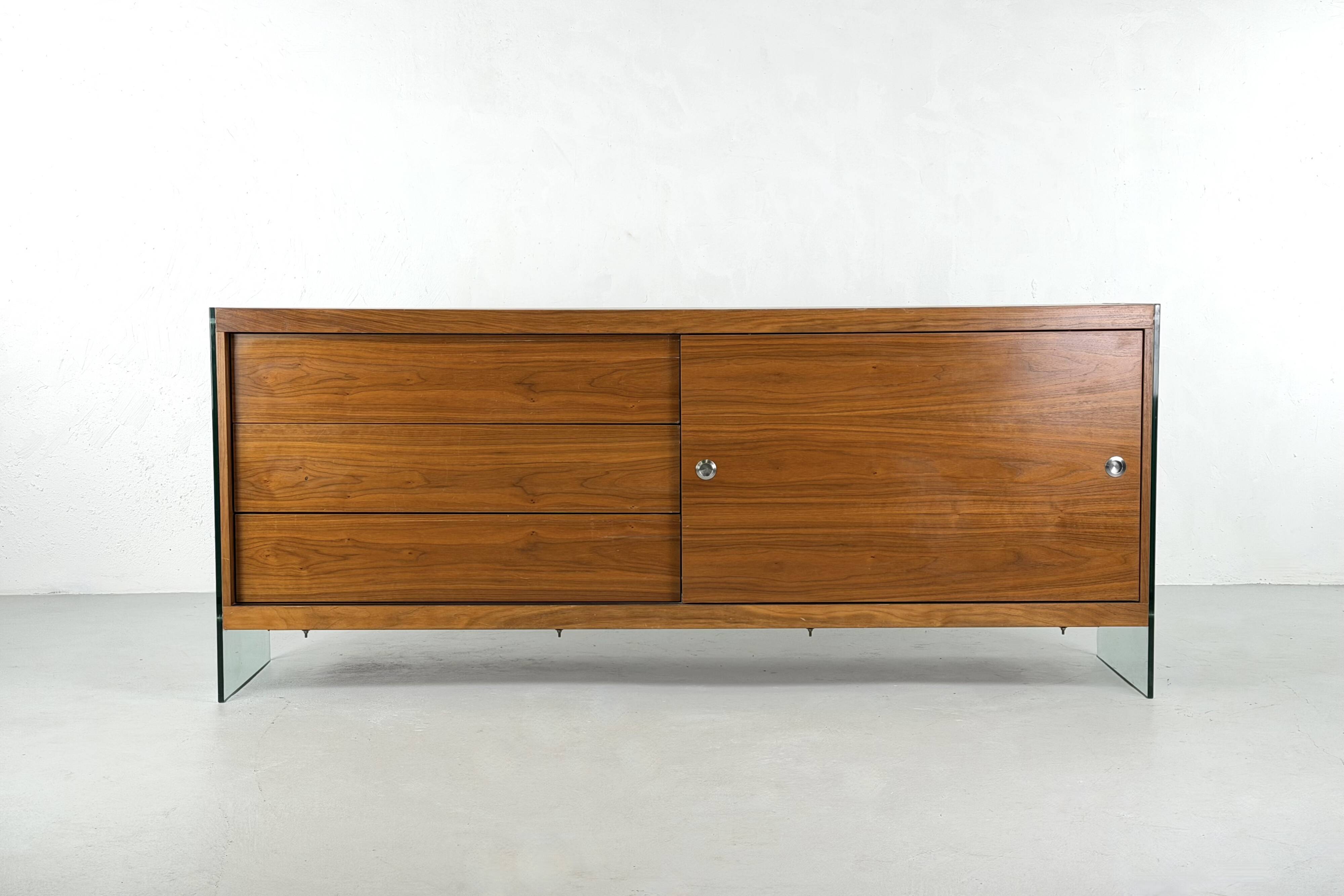 Teak sideboard with glass legs, France - 1990s